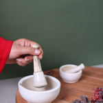 Kitchenware marble mortar & pestle in hand 