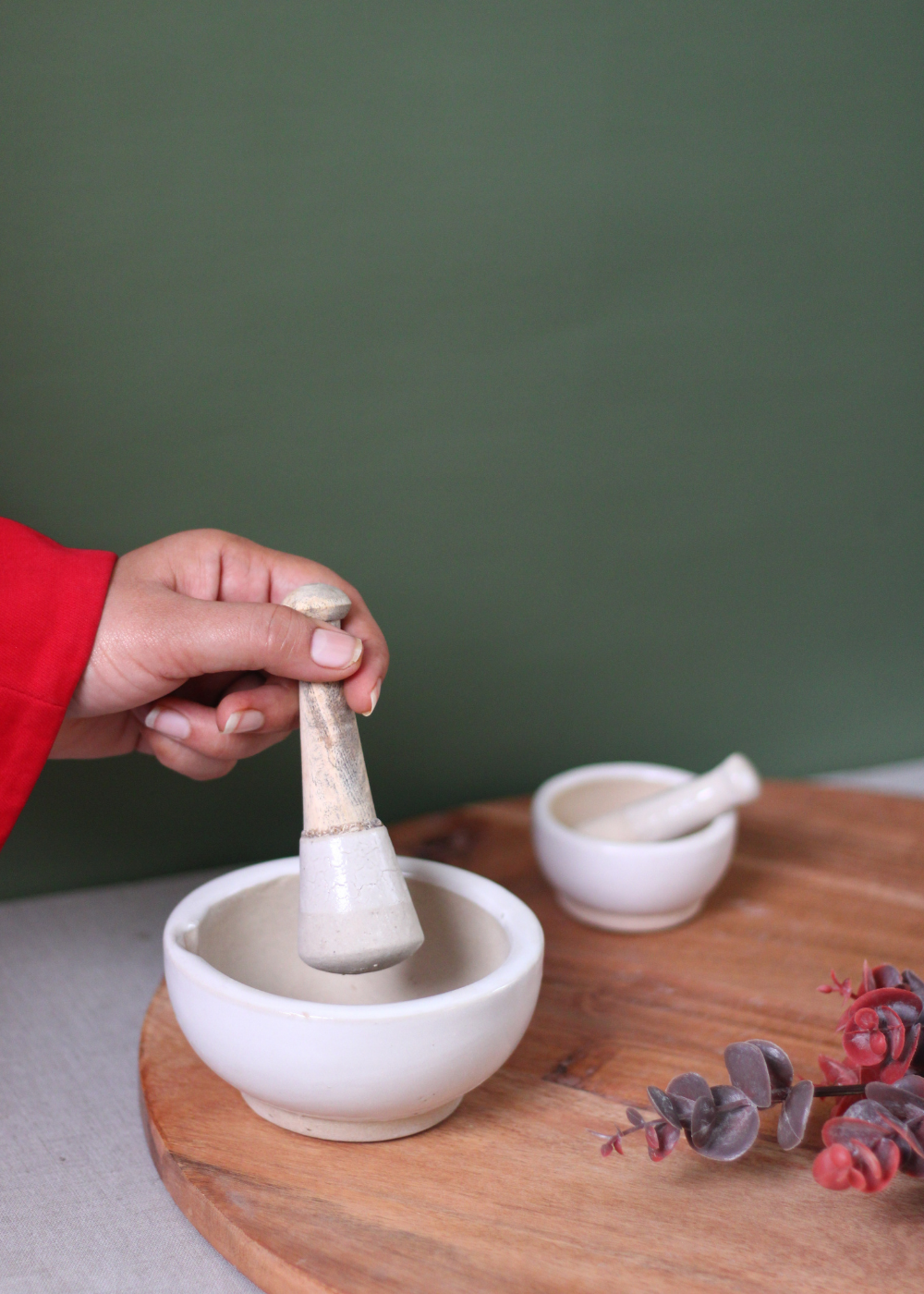 Kitchenware marble mortar & pestle in hand 