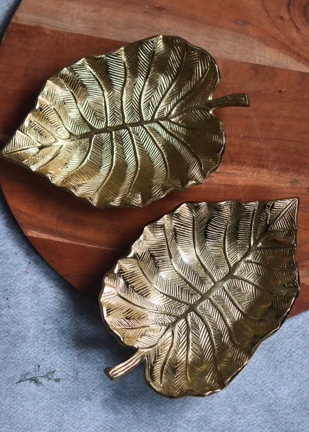 Two handmade metal bowls palm leaf design