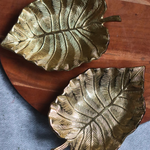 Two handmade metal bowls palm leaf design