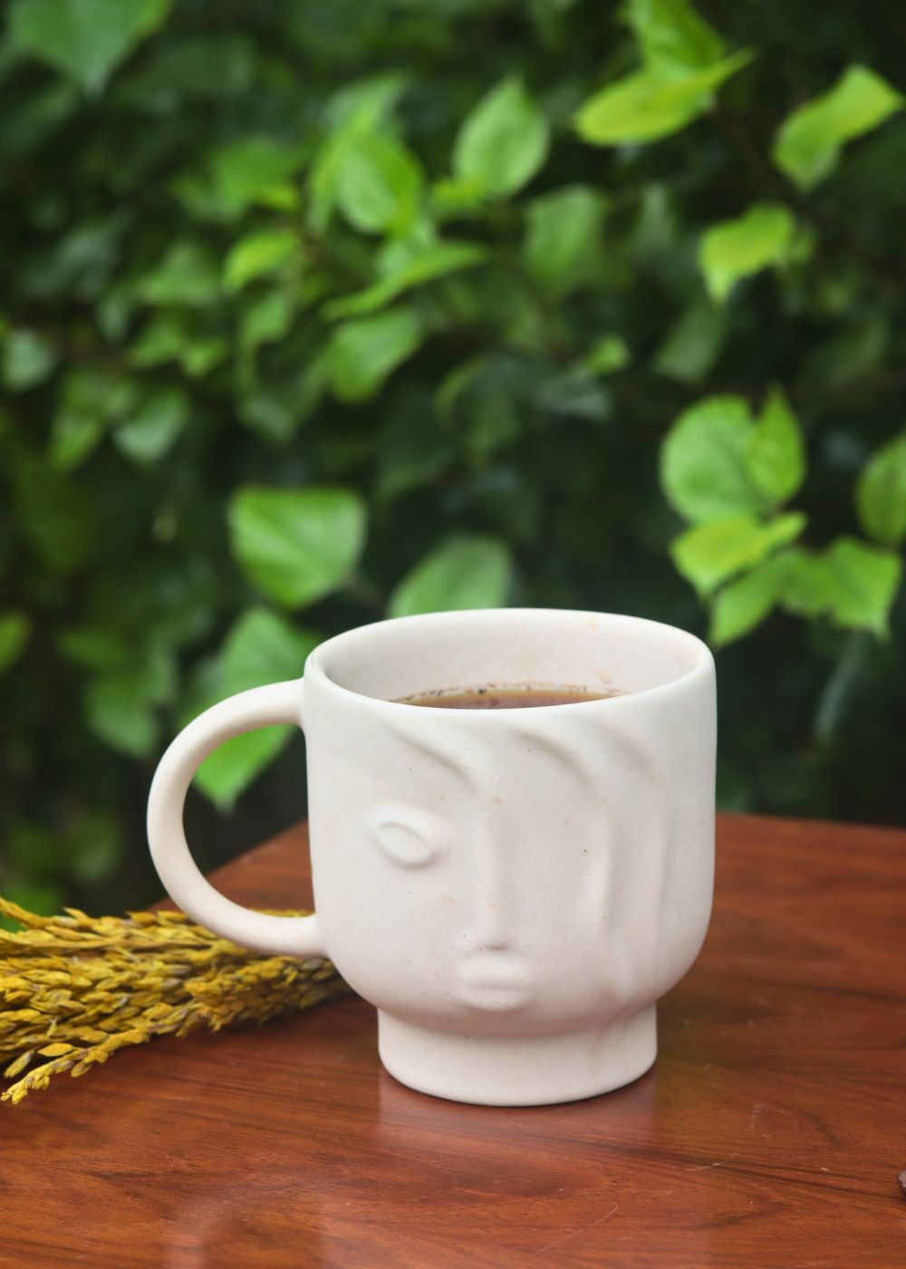 abstract face mug made by ceramic