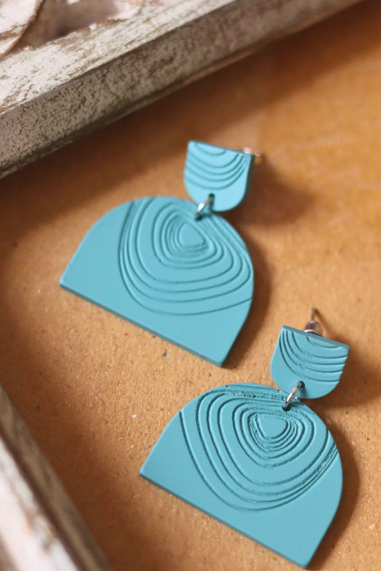 Serene Teal Earrings made by plastic