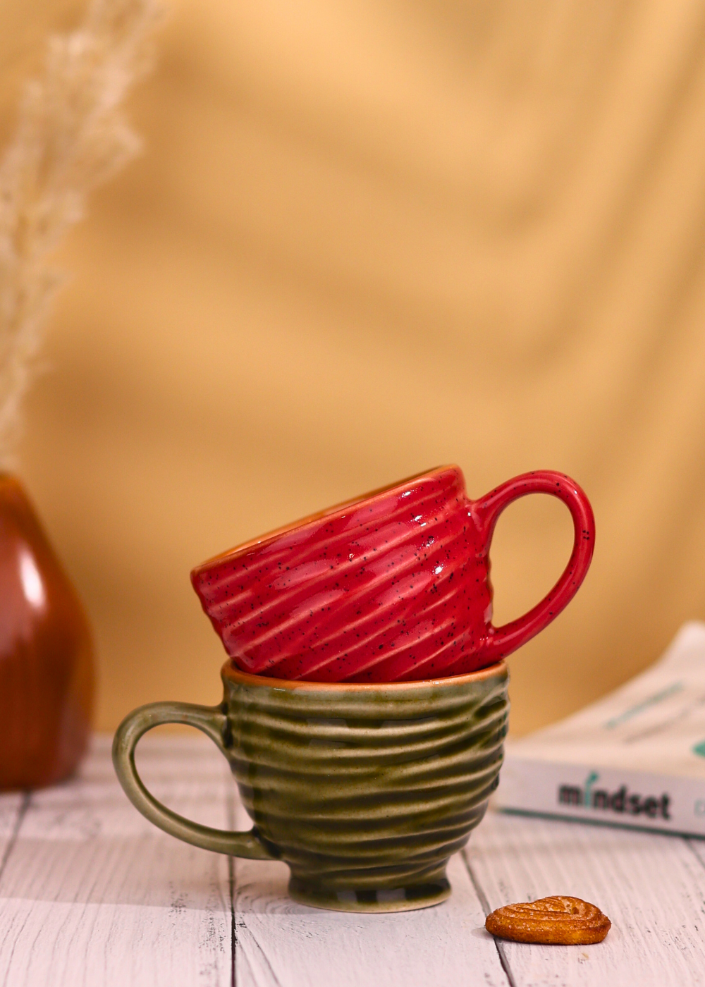 red & green torrent chai cup made by ceramic 
