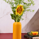 glossy yellow lined vase