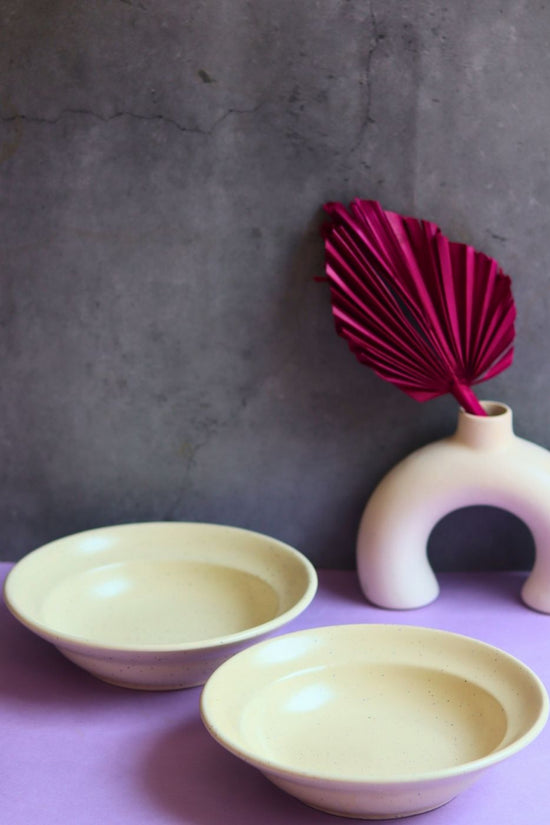 ivory pasta plate made by ceramic 