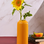 yellow lined vase with glossy finish