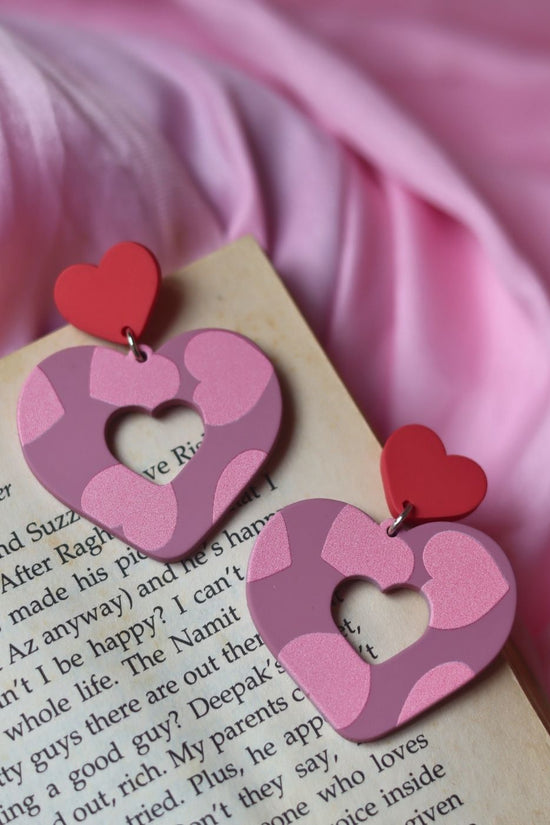 Heart beat earrings made by plastic