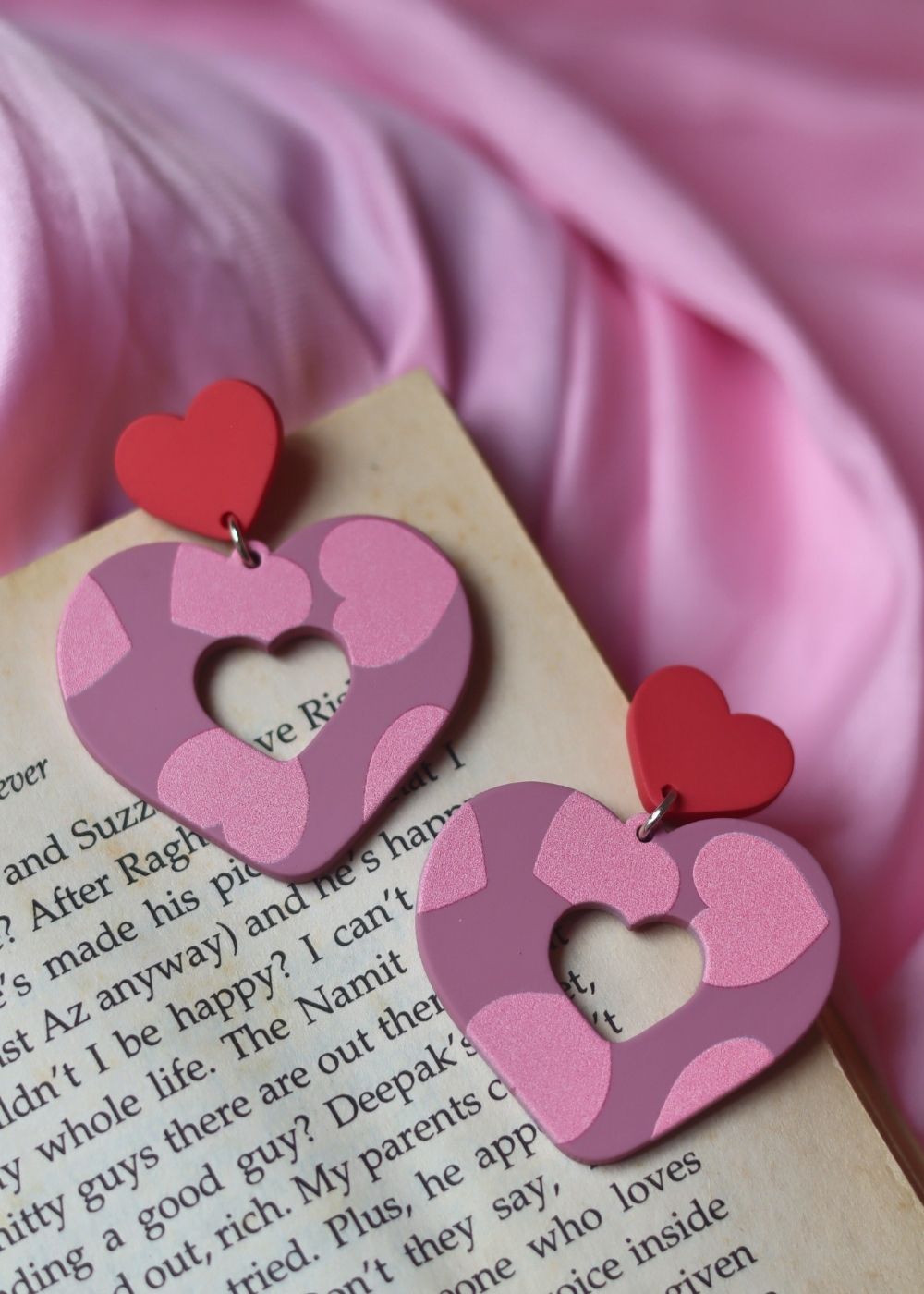Heart beat earrings made by plastic