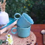 Teal wavy mug made by ceramic