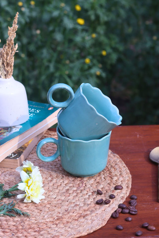 Teal wavy mug made by ceramic