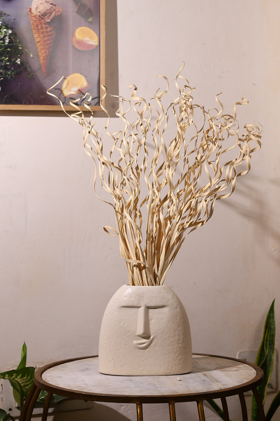 Dried natural bunch in white vase