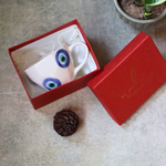 Handmade ceramic coffee mug in gift box