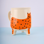 orange cat mug made by ceramic 