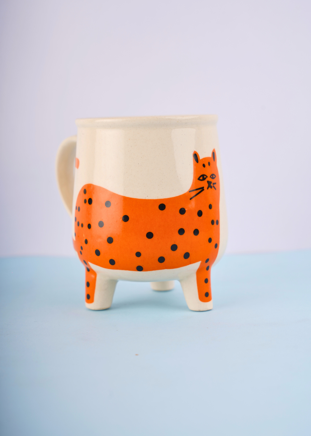 orange cat mug made by ceramic 