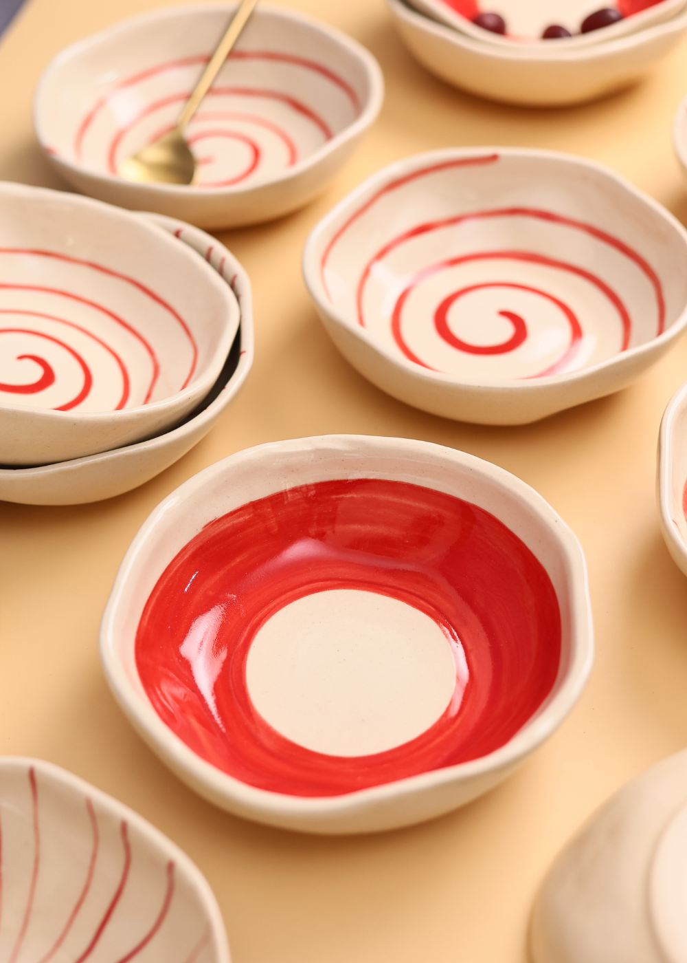 Red and white handmade ceramic bowls