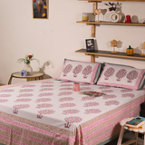 White beautiful bedsheet with pillows on bed