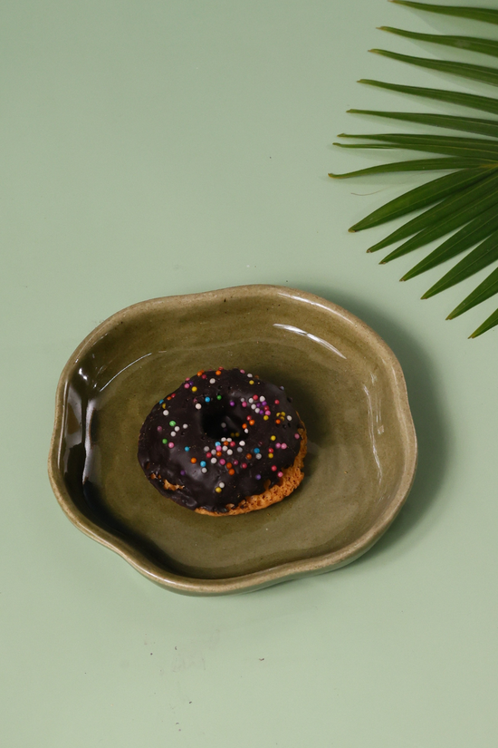 Green color handmade dessert plate with donuts