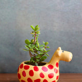 handmade giraffe table planter