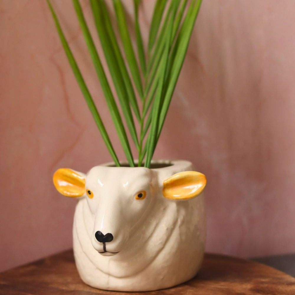 Cow planter made by ceramic