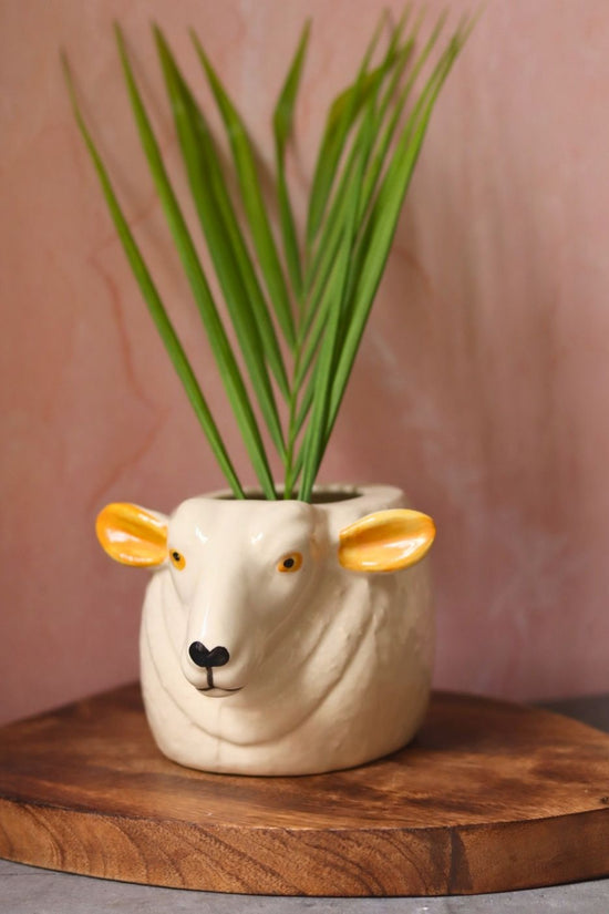 Cow planter made by ceramic