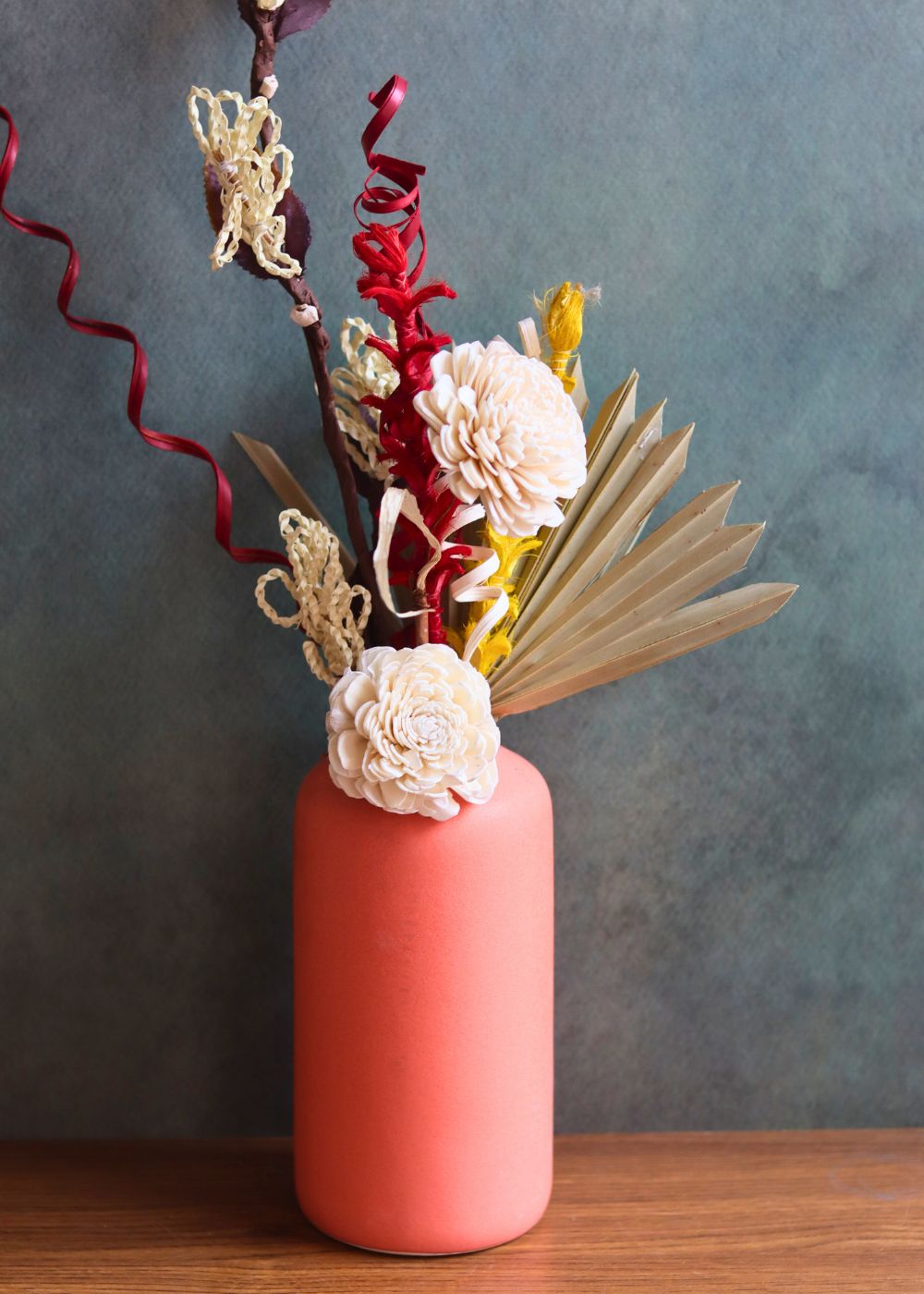handmade orange vase with assorted bunch combo 