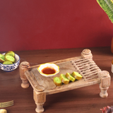 Handmade wooden serving tray with snacks
