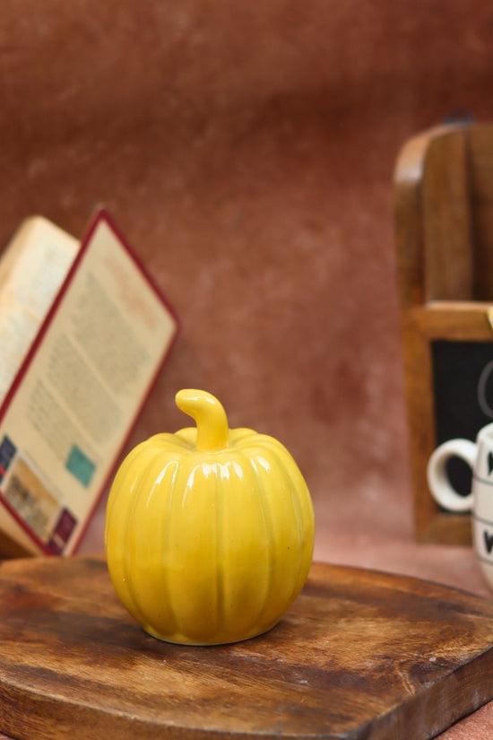 Yellow pumpkin made by ceramic