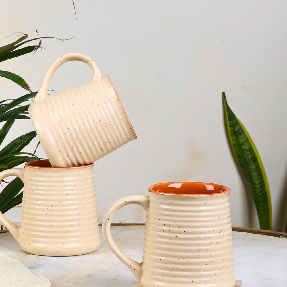 Three handmade ceramic coffee mugs 