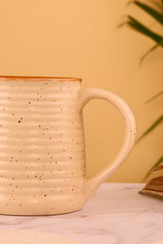 Handmade ceramic cream speckled coffee mug
