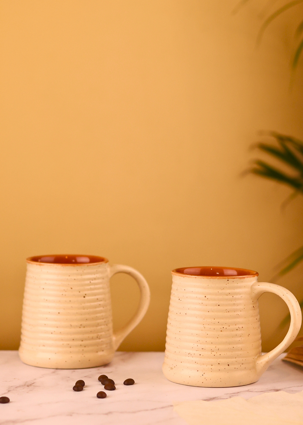Two cream speckled coffee mug 