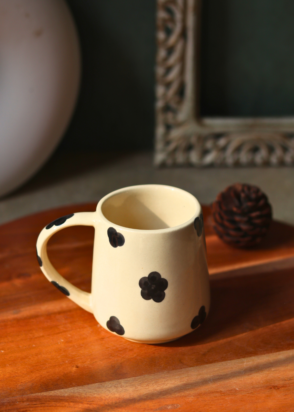 Handmade coffee mug on a wooden surface