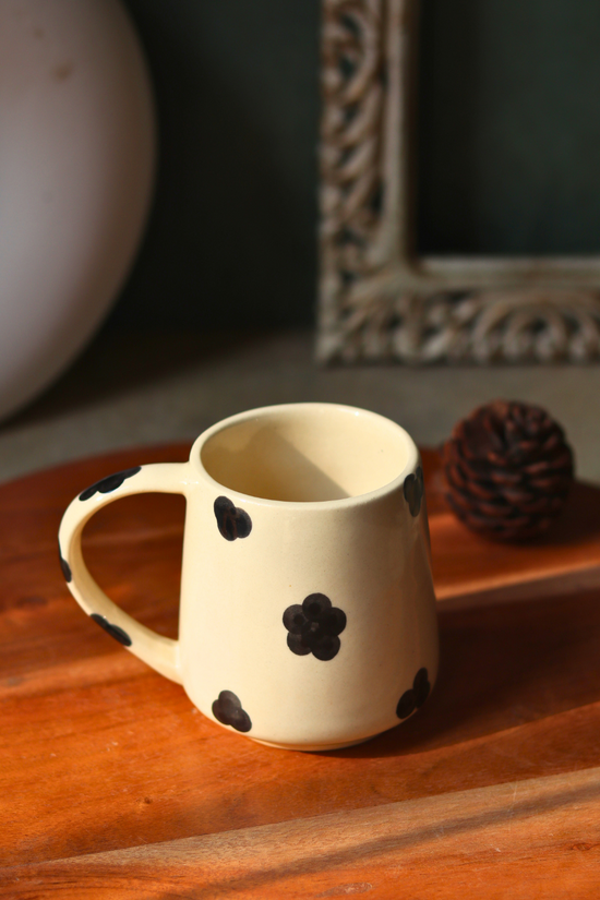 Handmade coffee mug on a wooden surface