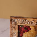 Carved floral wooden frame closeup