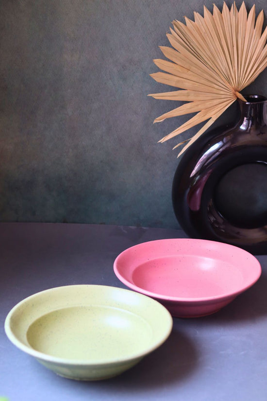 rosy pink & ivory pasta plates made by ceramic
