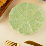 sage green cabbage snack plate with cabbage leaf design