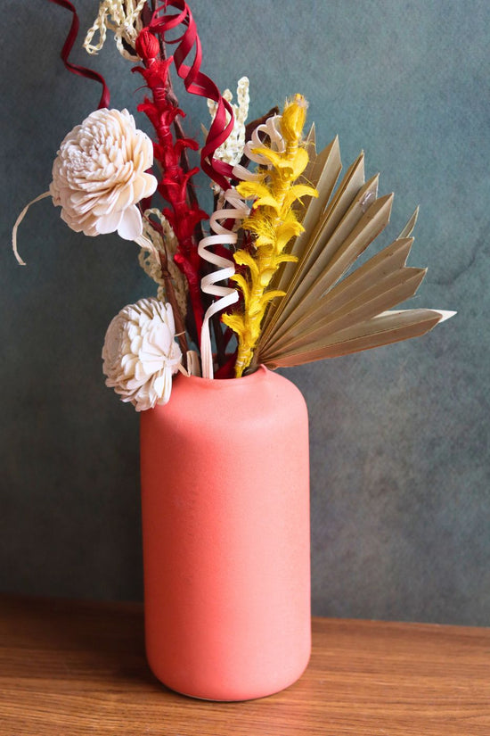 orange bloom vase with assorted  bunch combo for your home decor 
