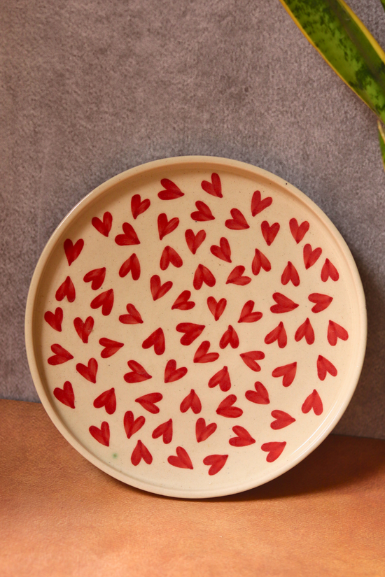 Handmade platter with red heart design