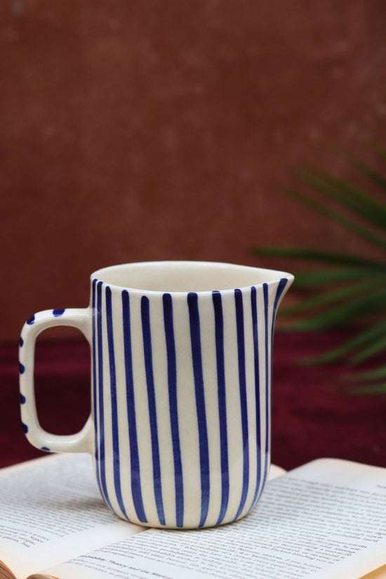 Blue striped jug made by ceramic