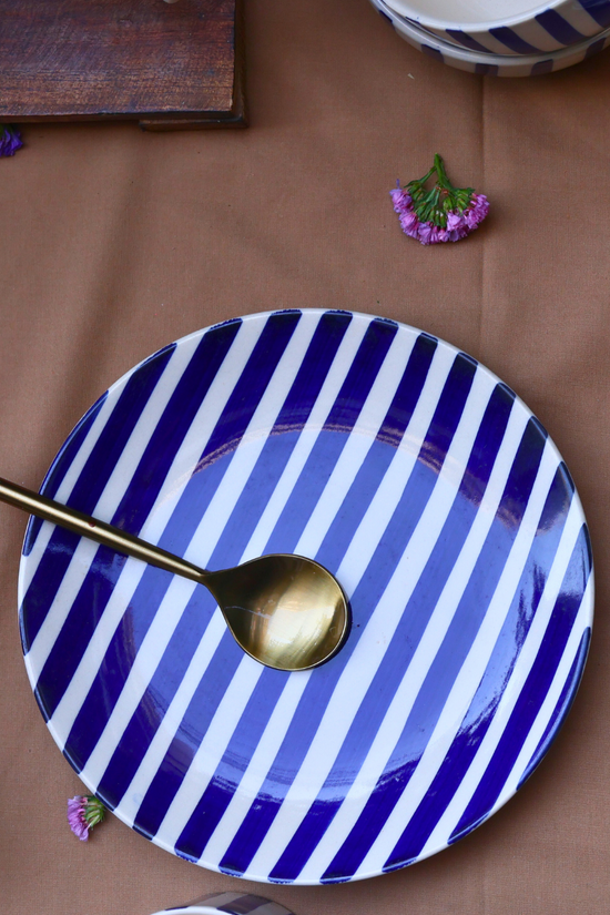 Handmade ceramic blue plate with spoon