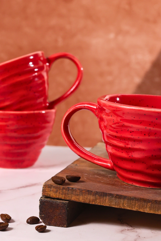 Red twirl coffee mug closeup shot 