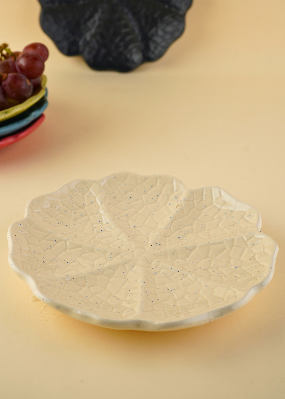 white cabbage snack plate with cabbage leaf design