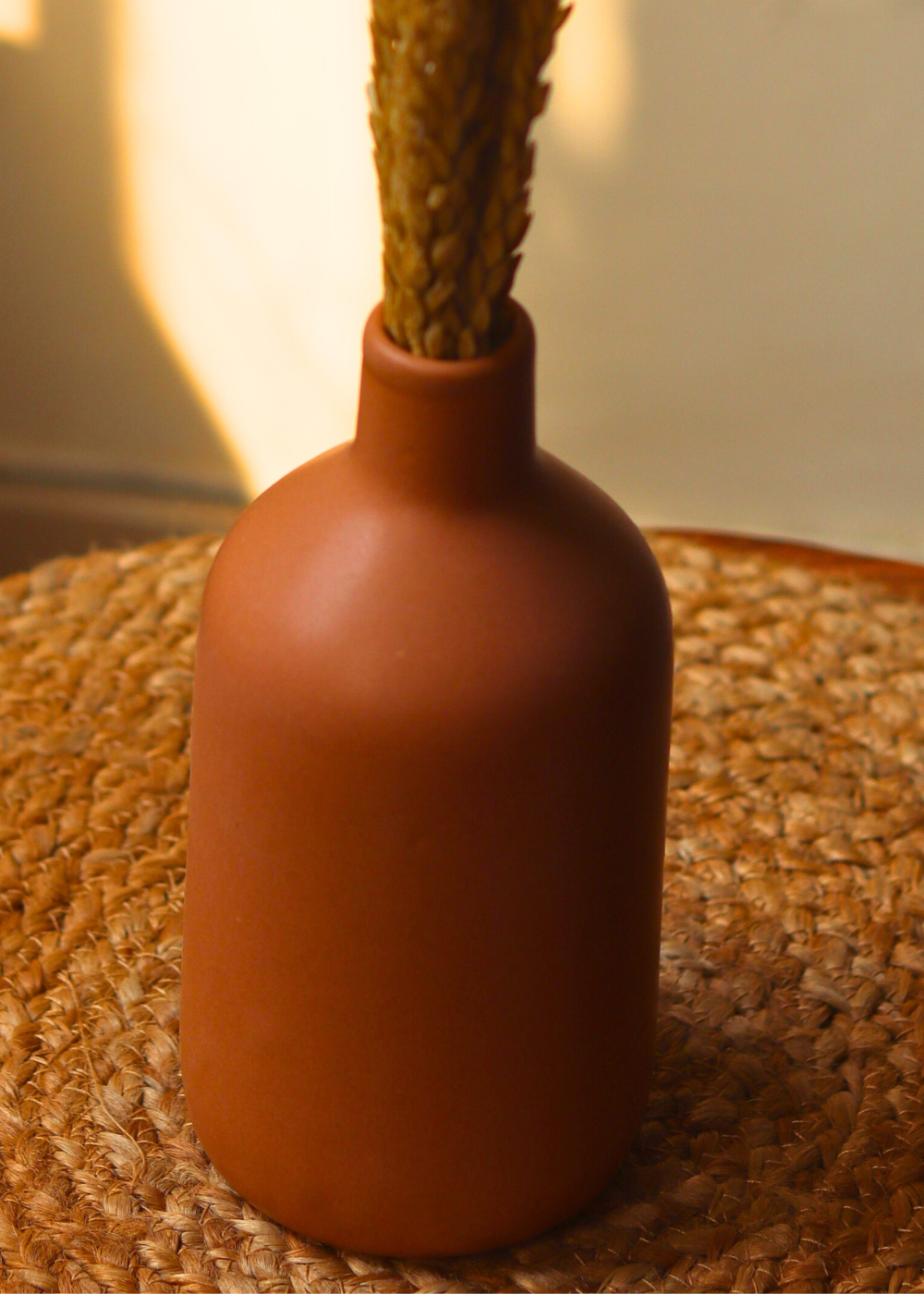Caramel vase on mat