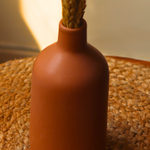 Caramel vase on mat