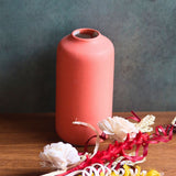 this orange bloom vase with asoorted bunch combo made by handcrafted