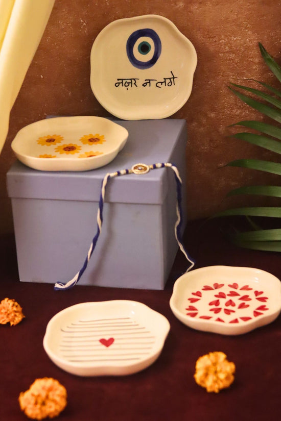Set of 4 - Hear, Striped heart, Surajmukhi & Nazar handmade dessert plate combo Rakhi Gift box made by ceramic