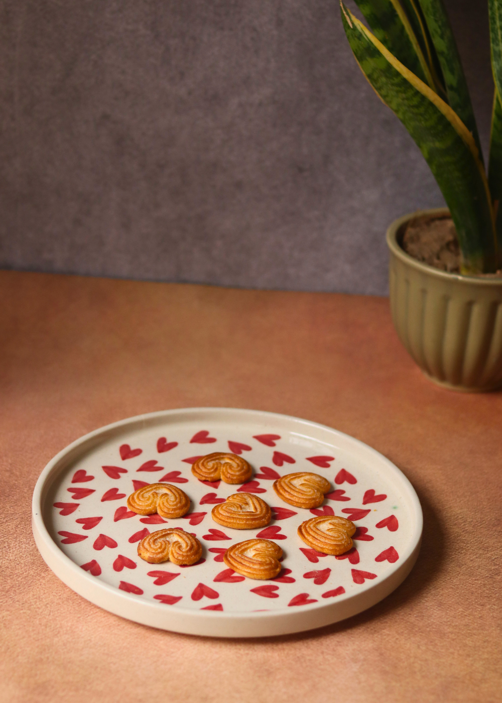 Red hearts handmade ceramic platter with biscuits 