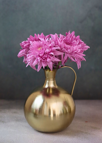 Brass mughal flower vase with pink flowers 