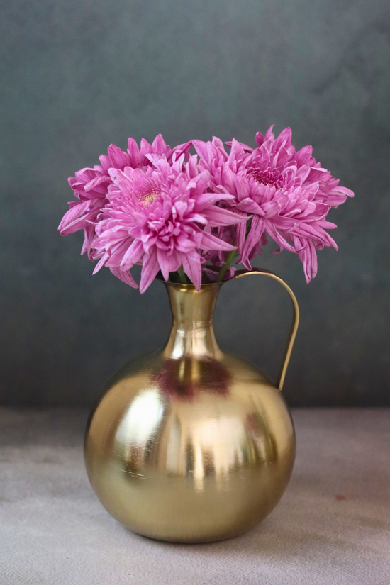 Brass mughal flower vase with pink flowers 