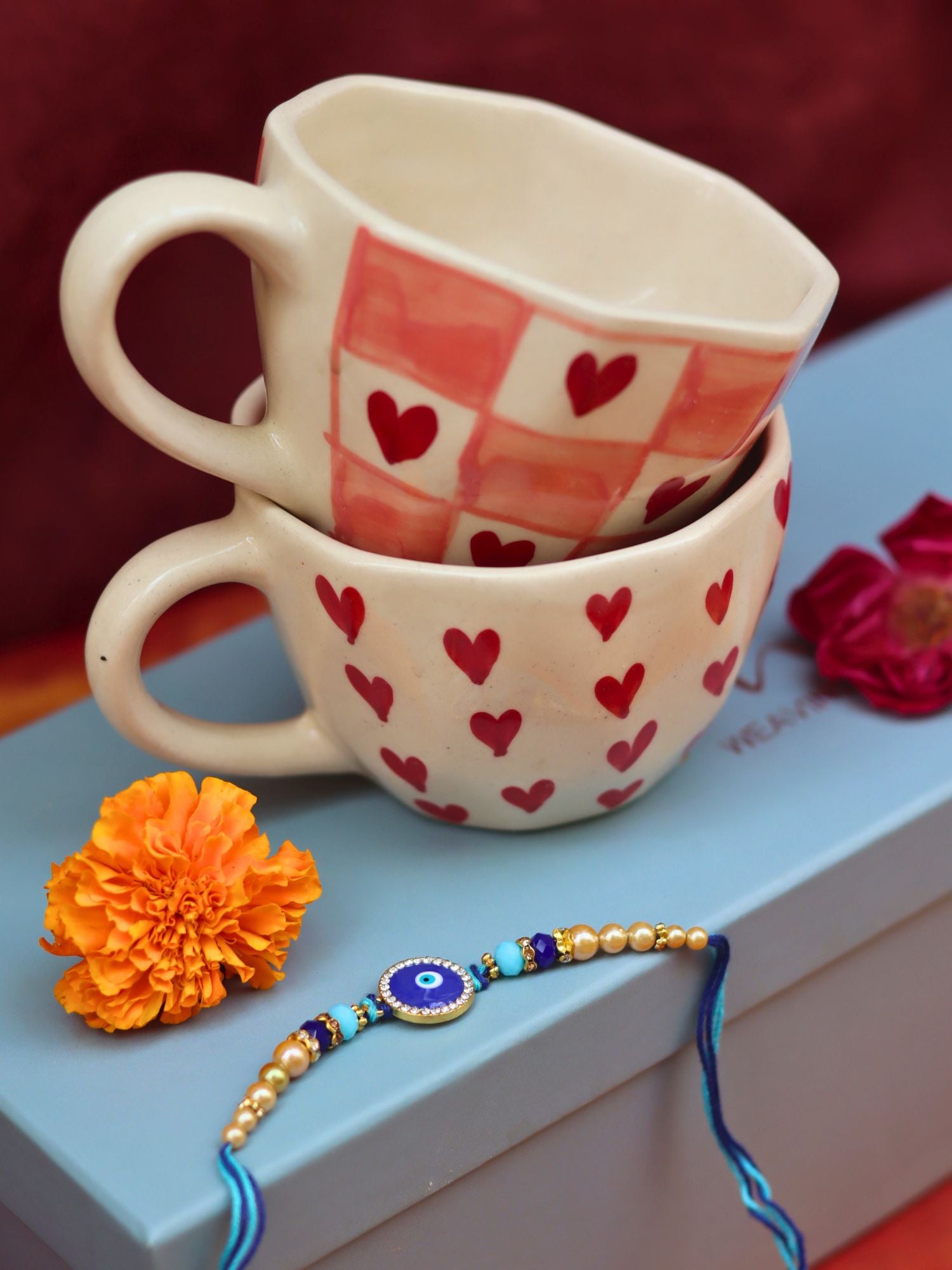 Heart & Chequered Heart in a Gift box with Rakhi with premium quality material