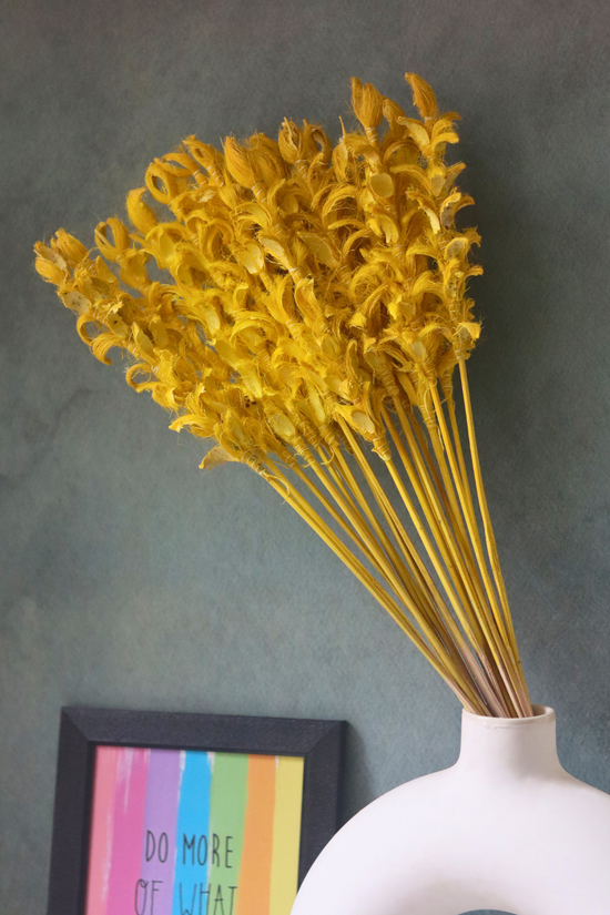 Yellow ginger flower bunch in vase 